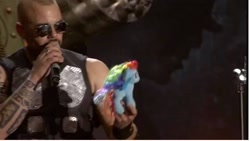 Size: 966x543 | Tagged: safe, rainbow dash, human, badass, irl, irl human, joakim brodén, metal, photo, sabaton, toy