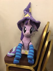 Size: 1536x2048 | Tagged: safe, artist:nekokevin, starlight glimmer, pony, unicorn, series:nekokevin's glimmy, chair, clothes, female, hat, irl, looking at you, mare, photo, plushie, sitting, smiling, socks, solo, striped socks, trixie's hat