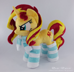 Size: 2510x2462 | Tagged: safe, artist:zizzaz, sunset shimmer, pony, unicorn, clothes, irl, photo, plushie, scarf, socks, solo, striped socks