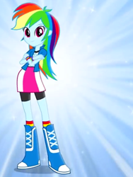 Size: 1536x2048 | Tagged: safe, derpibooru import, rainbow dash, equestria girls, blue background, boots, bracelet, clothes, commercial, compression shorts, crossed arms, female, jewelry, looking at you, magic of friendship (equestria girls), music video, simple background, skirt, socks, solo, sparkles, striped socks, wristband