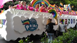 Size: 1200x675 | Tagged: safe, derpibooru import, rainbow dash, human, amazon.com, gay pride, irl, irl human, lgbt, murica, photo, pride, pride parade, united states