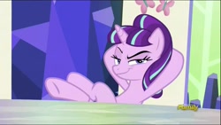 Size: 1136x640 | Tagged: safe, screencap, starlight glimmer, pony, unicorn, season 5, the cutie re-mark, crossed legs, discovery family logo, evil grin, friendship throne, hooves behind head, hooves on the table, looking at you, raised eyebrow, s5 starlight, smiling, smirk, smug, smuglight glimmer, solo, underhoof, welcome home twilight