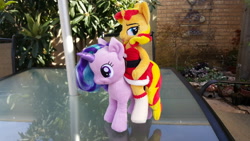 Size: 3264x1836 | Tagged: safe, artist:ketika, starlight glimmer, sunset shimmer, anthro, pony, unicorn, anthro plushie, anthro with ponies, anthros riding ponies, aurora, clothes, female, irl, mare, photo, plushie, posable, riding, santa costume, socks, stockings, sunset santa