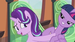 Size: 1280x720 | Tagged: safe, screencap, starlight glimmer, twilight sparkle, twilight sparkle (alicorn), alicorn, pony, the crystalling, female, grin, lidded eyes, mare, out of context