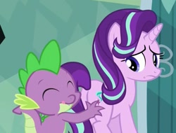 Size: 925x703 | Tagged: safe, screencap, spike, starlight glimmer, dragon, pony, the crystalling, butt touch, eyes closed, female, hand on butt, mare, out of context, plot, pushing, rump push, tongue out