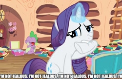 Size: 881x572 | Tagged: safe, edit, edited screencap, screencap, rarity, spike, dragon, pony, unicorn, secret of my excess, biting, book, caption, female, fire ruby, magic, male, mare