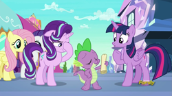 Size: 1469x821 | Tagged: safe, screencap, fluttershy, rarity, spike, starlight glimmer, twilight sparkle, twilight sparkle (alicorn), alicorn, dragon, pegasus, pony, unicorn, the crystalling, discovery family logo, facehoof, female, mare, scroll