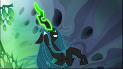 Size: 1024x576 | Tagged: safe, screencap, queen chrysalis, changeling, changeling queen, to where and back again, cocoon, evil grin, female, glowing eyes, glowing horn, grin, rearing, smiling, solo