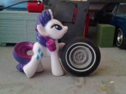 Size: 900x675 | Tagged: safe, rarity, blind bag, diorama, irl, photo, scale model, tire, toy