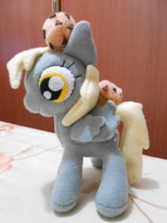 Size: 480x640 | Tagged: safe, artist:legadema, derpy hooves, pegasus, pony, female, irl, mare, muffin, photo, plushie, solo