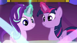 Size: 592x333 | Tagged: safe, screencap, starlight glimmer, twilight sparkle, twilight sparkle (alicorn), alicorn, pony, spice up your life, cropped, cute, duo, duo female, female, looking down, magic, smiling, twilight's castle