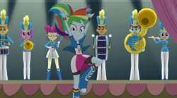 Size: 1400x777 | Tagged: safe, derpibooru import, screencap, majorette, rainbow dash, equestria girls, friendship games, background human, boots, chs rally song, clothes, compression shorts, rainbow dash always dresses in style, shako, shirt, shoes, skirt, sweatshirt, t-shirt