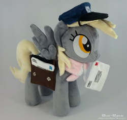 Size: 1827x1731 | Tagged: safe, artist:zizzaz, derpy hooves, pony, accessories, bags, clothes, hat, irl, letter, mailmare, photo, plushie, scarf, solo