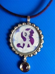 Size: 478x640 | Tagged: safe, rarity, pony, unicorn, female, horn, jewelry, mare, merchandise, necklace, solo