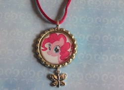 Size: 400x289 | Tagged: safe, pinkie pie, earth pony, pony, female, jewelry, mare, merchandise, necklace, pink coat, pink mane