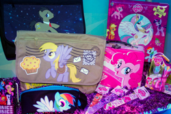 Size: 630x420 | Tagged: safe, derpy hooves, doctor whooves, pinkie pie, pegasus, pony, female, lunchbox, mailbag, mare, merchandise, messenger bag, official