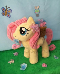 Size: 600x747 | Tagged: safe, artist:sequinjar, fluttershy, butterfly, parasprite, pony, cute, flower, flower in mouth, irl, mouth hold, photo, plushie