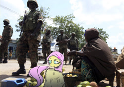 Size: 1420x1000 | Tagged: safe, fluttershy, human, gun, helmet, hijab, irl, irl human, islam, islamashy, photo, ponies in real life, uganda