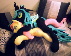 Size: 1715x1350 | Tagged: safe, artist:agatrix, artist:blackwater627, fluttershy, queen chrysalis, changeling, changeling queen, pegasus, pony, bed, chrysashy, cuddling, female, irl, lesbian, lying down, on side, photo, plushie, shipping, spooning