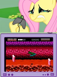 Size: 563x752 | Tagged: safe, fluttershy, pegasus, pony, battletoads, controller, cruel, exploitable meme, female, fluttercry, gamershy, hoof hold, lip bite, mare, meme, pink mane, teary eyes, teeth, that one level, tv meme, yellow coat