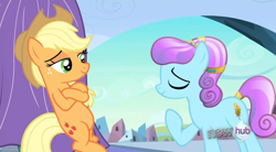 Size: 848x469 | Tagged: safe, screencap, applejack, sapphire joy, crystal pony, earth pony, pony, hat