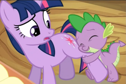 Size: 723x484 | Tagged: safe, derpibooru import, screencap, spike, twilight sparkle, dragon, pony, unicorn, female, hug, leg hug, male, mare