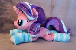 Size: 1024x680 | Tagged: safe, artist:fafatacle, starlight glimmer, clothes, irl, lidded eyes, photo, plushie, prone, socks, solo, striped socks