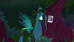 Size: 1280x720 | Tagged: safe, screencap, queen chrysalis, twilight sparkle, twilight sparkle (alicorn), alicorn, changeling, changeling queen, the mean 6, female, hair, photo, picture, solo, tree