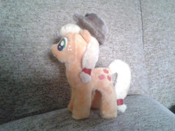 Size: 570x428 | Tagged: safe, artist:emii234, applejack, pony, irl, photo, plushie, solo