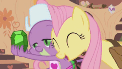 Size: 640x360 | Tagged: safe, fluttershy, spike, dragon, pegasus, pony, just for sidekicks, animated, cute, shyabetes, snuggling, spikelove