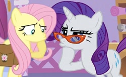 Size: 574x348 | Tagged: safe, fluttershy, rarity, pegasus, pony, unicorn, female, glasses, mare, pink mane, purple mane, white coat, yellow coat