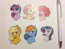 Size: 2048x1536 | Tagged: safe, artist:lrusu, derpibooru import, applejack, fluttershy, pinkie pie, rainbow dash, rarity, twilight sparkle, pony, bust, irl, mane six, pencil, photo, portrait, smiling, sticker