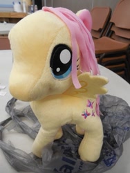 Size: 525x700 | Tagged: safe, fluttershy, funrise, irl, official, photo, plushie, solo