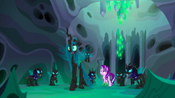 Size: 1440x809 | Tagged: safe, screencap, queen chrysalis, starlight glimmer, thorax, changeling, changeling queen, pony, unicorn, to where and back again, armor, changeling guard, changeling hive, changeling slime, cocoon, disguise, disguised changeling, fake starlight glimmer, female, helmet, mare