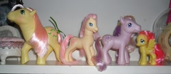 Size: 640x278 | Tagged: safe, fluttershy, fluttershy (g3), posey, pegasus, pony, g1, g2, g3, g4, sky skimmer, toy