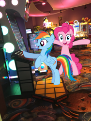 Size: 1512x2016 | Tagged: safe, derpibooru import, pinkie pie, rainbow dash, cyber quest, deal or no deal, four winds resort, irl, michigan, new buffalo, photo, ponies in real life