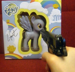 Size: 1000x950 | Tagged: safe, derpy hooves, pegasus, pony, anti-brony, background pony strikes again, edgy, fashion style, female, gun, internet tough guy, irl, lookadis mudda fugga, mare, op is a cuck, ow the edge, photo, toy, toy abuse