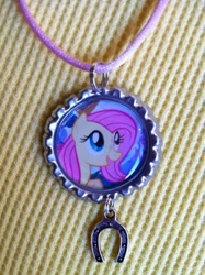 Size: 478x640 | Tagged: safe, fluttershy, pegasus, pony, female, jewelry, mare, necklace, pink mane, yellow coat