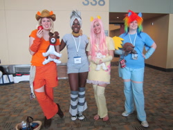 Size: 1024x768 | Tagged: artist needed, safe, artist:insanefastone, artist:sweetapplehonesty, derpibooru import, applejack, fluttershy, rainbow dash, zecora, human, 2012, convention, cosplay, irl, irl human, otakon, photo, plushie