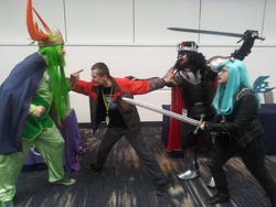 Size: 4160x3120 | Tagged: safe, artist:mummifiedthunderbird, king sombra, queen chrysalis, thorax, changedling, changeling, human, babscon, babscon 2019, clothes, convention, cosplay, costume, irl, irl human, king thorax, photo, sword, weapon