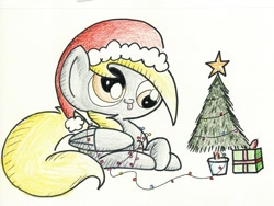 Size: 896x672 | Tagged: safe, artist:getchanoodlewet, derpy hooves, pegasus, pony, christmas tree, cute, female, hat, mare, present, prone, santa hat, solo, tongue out, traditional art, tree