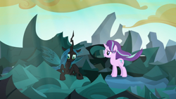 Size: 1280x720 | Tagged: safe, screencap, queen chrysalis, starlight glimmer, changeling, changeling queen, pony, unicorn, to where and back again, changeling hive, cloud, duo, female, mare, ruins, sunlight, windswept mane