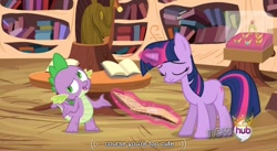 Size: 848x466 | Tagged: safe, derpibooru import, screencap, spike, twilight sparkle, dragon, magical mystery cure, book, elements of harmony, hub logo, youtube caption