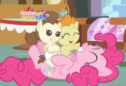 Size: 515x352 | Tagged: safe, screencap, pinkie pie, pound cake, pumpkin cake, earth pony, pony, baby cakes, babies, baby ponies, cake, cake twins, candy, colt, cute, diaper, diapered, diapered colt, diapered filly, diapered foals, eyes closed, female, filly, foal, grin, happy, happy babies, male, on back, open mouth, playing, siblings, sitting, smiling, table, tickling, twins, white diapers