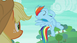 Size: 1280x720 | Tagged: safe, derpibooru import, screencap, applejack, rainbow dash, earth pony, pegasus, pony, non-compete clause, eyes closed, female, flying, freckles, mare, pose, raised hoof, spread wings, wings