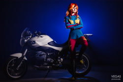 Size: 4000x2667 | Tagged: safe, artist:sunny-tooi, photographer:duginpv, sunset shimmer, human, equestria girls, friendship games, absurd resolution, clothes, cosplay, costume, crossed arms, irl, irl human, motorcross, motorcycle, photo, smiling, solo