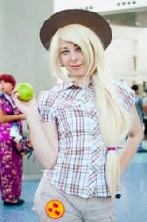 Size: 712x1072 | Tagged: safe, artist:agentt3xas, applejack, human, anime expo, apple, convention, cosplay, irl, irl human, obligatory apple, photo