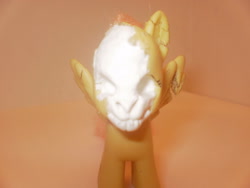 Size: 1024x768 | Tagged: safe, artist:fonypan, fluttershy, pegasus, pony, brushable, sculpture, skull, toy, toy abuse