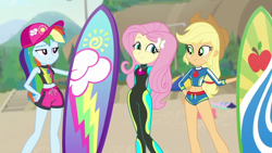 Size: 1280x720 | Tagged: safe, derpibooru import, screencap, applejack, fluttershy, rainbow dash, better together, blue crushed, equestria girls, adorasexy, beach, clothes, cute, hips, sexy, shyabetes, surfboard, swimsuit, wetsuit