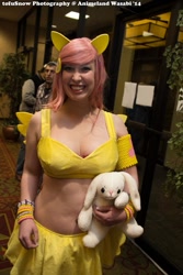 Size: 683x1024 | Tagged: safe, artist:rae-gunn, fluttershy, human, rabbit, animeland wasabi, animeland wasabi 2014, clothes, cosplay, irl, irl human, midriff, photo, plushie, skirt, solo